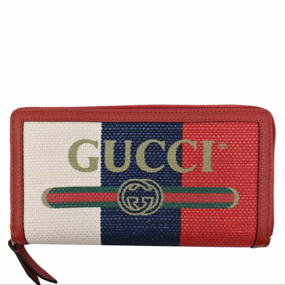 Gucci Web Stripe Canvas Zippy
Wallet Multicolor 524790